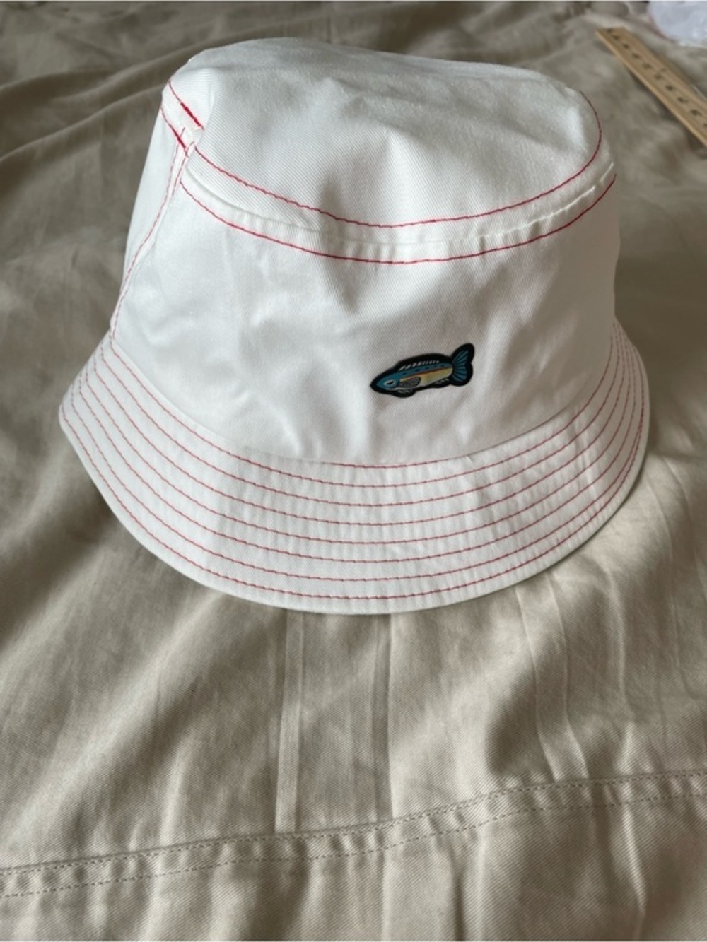 Off White Bucket Hat with Red Stitching and Fish Patch and State Farm logo NWOT